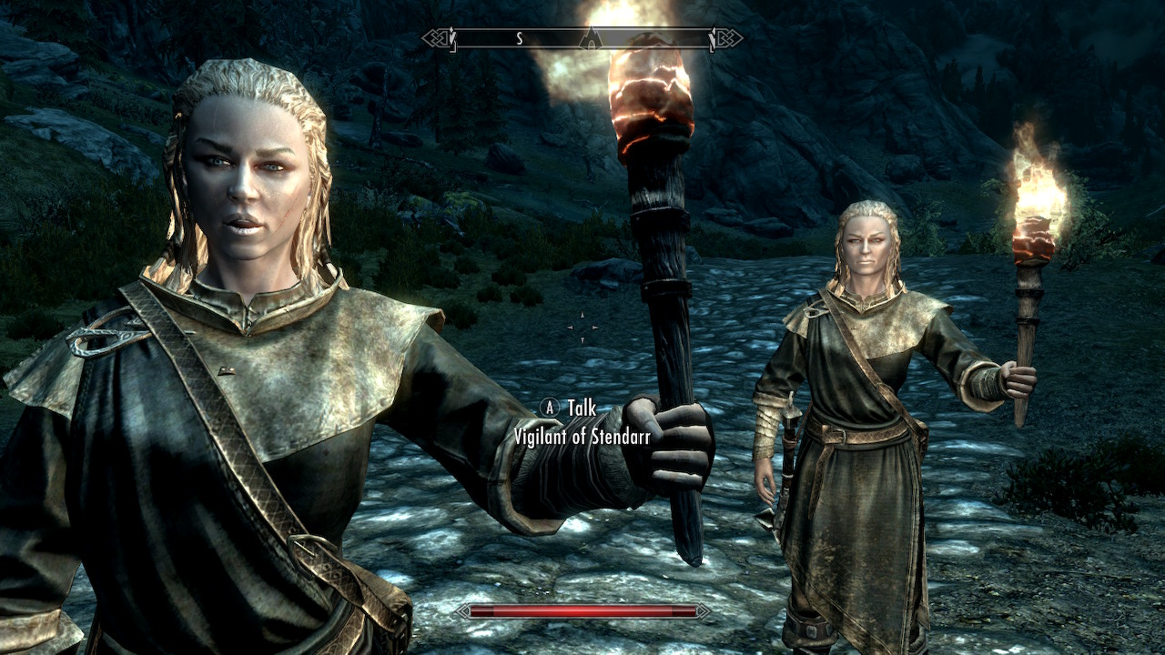 a Skyrim screenshot of two identical Vigilants of Stendarr standing next to one another.